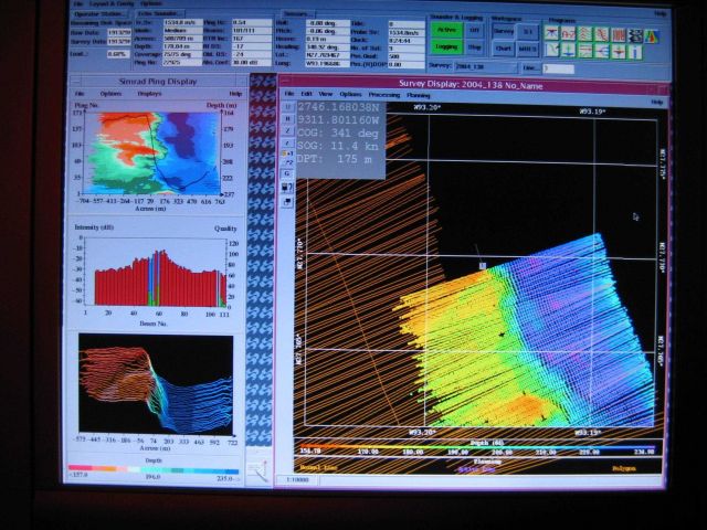Computer displays associated with survey data acquisition and processing on the NOAA Ship THOMAS JEFFERSON. Picture