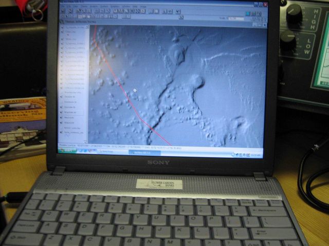 Computer displays associated with survey data acquisition and processing on the NOAA Ship THOMAS JEFFERSON. Picture