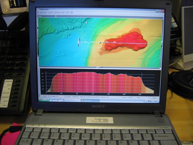 Computer displays associated with survey data acquisition and processing on the NOAA Ship THOMAS JEFFERSON. Picture