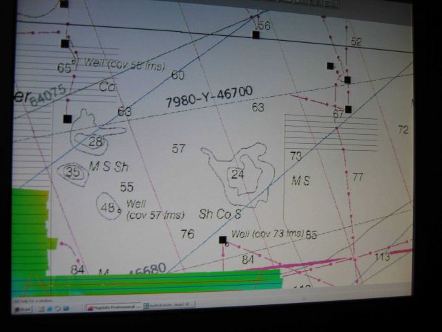 Computer displays associated with survey data acquisition and processing on the NOAA Ship THOMAS JEFFERSON. Picture