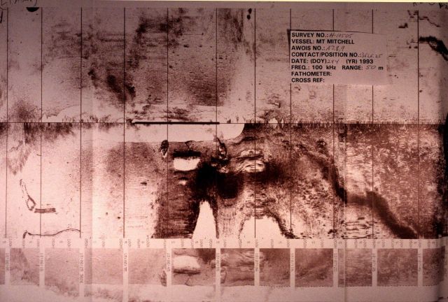 Side scan sonar record of wreck debris or structure on seafloor. Picture