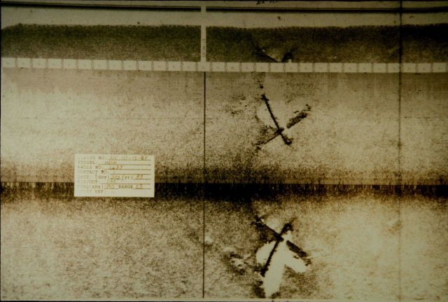 Side scan sonar image of what appears to be two aircraft on seafloor. Picture