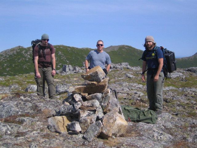 Assistant survey tech Bart Nuckols on left, general vessel assistant Kirk Loeffler, and survey tech Weston Renoud after packing to GPS recording site  Picture