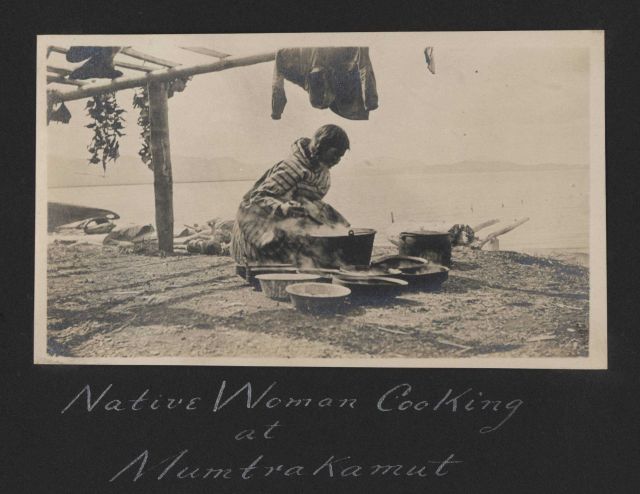 Native woman cooking at Mumtrakamut. Picture