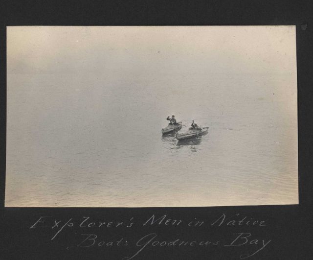 Crewmembers from EXPLORER trying out native kayaks. Picture