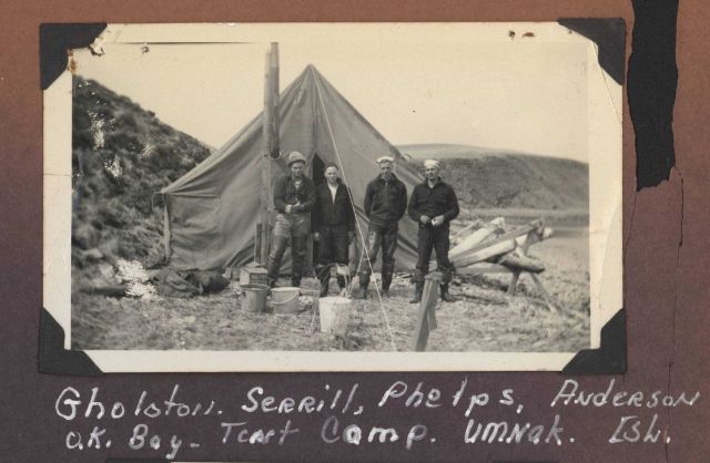 Gholston, Serrill, Phelps, and Anderson at the OK Bay tent camp. Picture