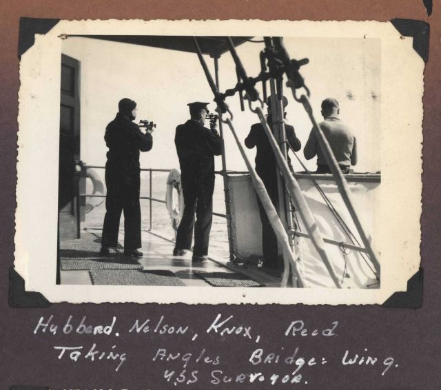 Ship's officers, Hubbard, Nelson, Knox and Reed taking horizontal sextant angles on starboard bridge wing of USC&GSS SURVEYOR Picture