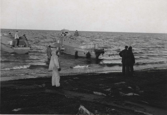 Hauling survey launch out of water Picture