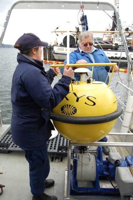 Preparing to deploy oceanographic equipment from survey launch. Picture