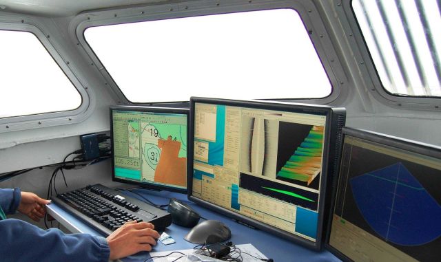 Monitoring survey operations on a NOAA Ship RAINIER survey launch. Picture