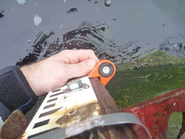 Assuring tide staff is installed properly and absolutely vertical. Picture