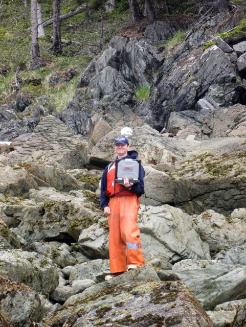 Walking shoreline with Trimble GPS receiver to map shoreline and check obstructions seen on aerial photography. Picture