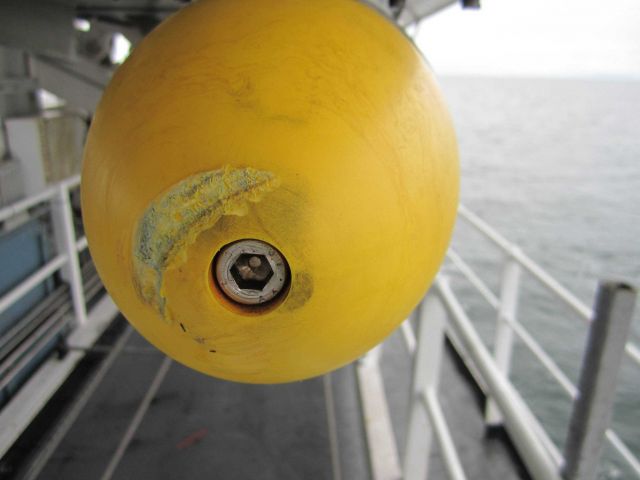 The forward end of a hull-mounted sidescan sonar unit that has struck an obstruction. Picture
