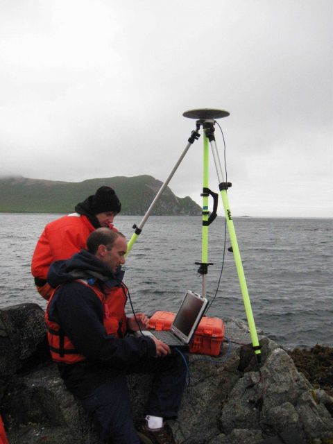 Brandy Geiger (L) and Bill Carrier working on horizontal control station set up at Bird Island. Picture