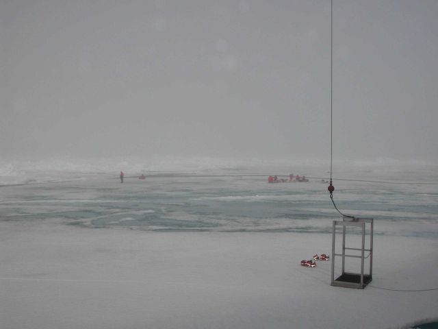Scientists work on the ice in foggy weather Picture