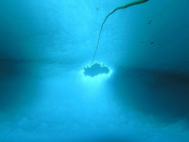 The dive entry and exit hole for under-ice divers. Picture