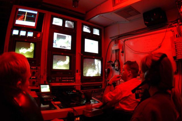 Sonsub pilot Maurice Rivard at far right flying the Innovator ROV during surveys at Viosca Knoll, with Sonsub technician Keith Hyatt and scientist San Picture
