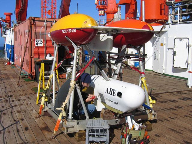 Andy Billings, an engineering assistant at Woods Hole Oceanographic Institution, makes final checks on ABE (the autonomous benthic explorer) leading u Picture