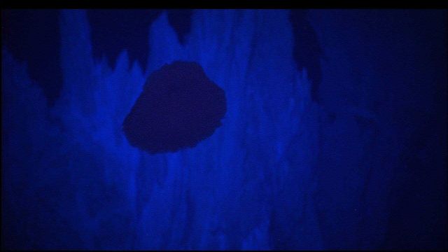 Hercules captured this image of a deep-sea jelly fish, possibly Poralia rufescens, undulating several meters above the seafloor just south of the IMAX Picture