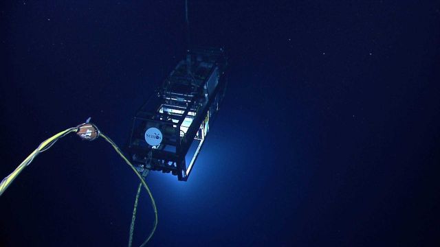 Seirios photograped from Little Hercules while still secure to the ship pickup cable that can be seen trending vertically to its top. Picture