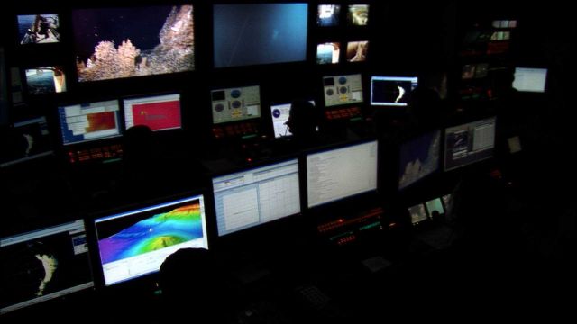 Reminiscent of a NASA mission, scientists and engineers monitor navigation and observations of Seirios and Little Hercules in control room. Picture