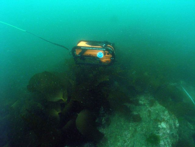 A view of the Seabotix ROV operating underwater studying the debris field of the HASSLER. Picture