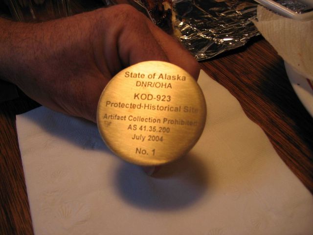 State of Alaska monument indicating that the Kad'yak shipwreck is on record as a protected state historical site. Picture