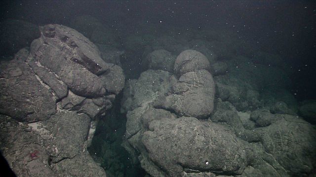 Crevasse cutting through pillow lavas Picture