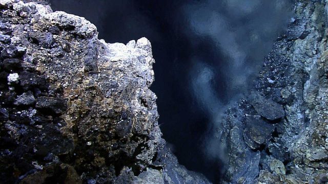 Looking through the shimmering water of a hydrothermal vent. Picture