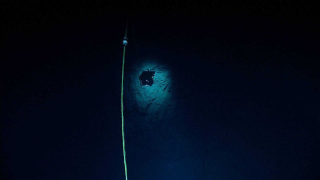 Little Hercules ROV inspecting a vertical wall as seen from Serios. Picture