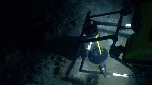 The Little Hercules remotely operated vehicle, outfitted with a 'methane bucket' capture device, captures gas bubbles percolating up from a seafloor g Picture