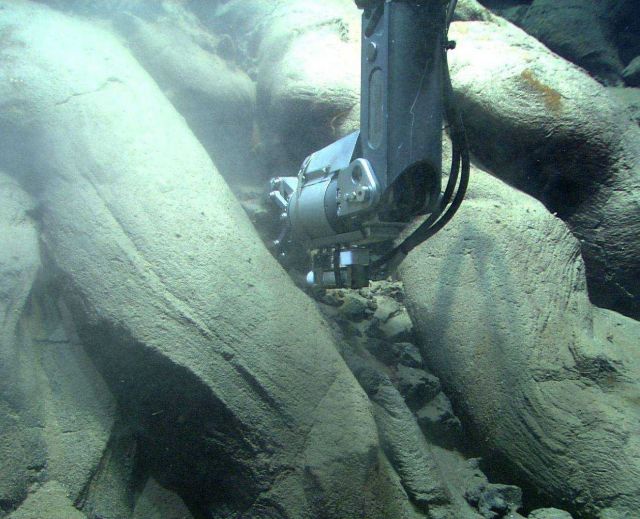 Quest 4000 ROV collects a rock sample among pillow lava at Mata Ua. Picture