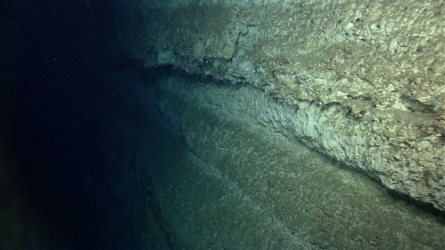 Distinctly different sedimentary layers are seen along the canyon wall Picture