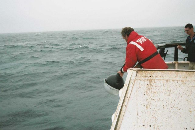 Deploying a drifter buoy. Picture