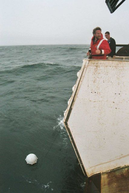 Deploying a drifter buoy. Picture