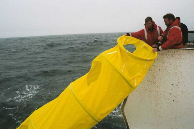 Deploying drogue attached to drifter buoy. Picture