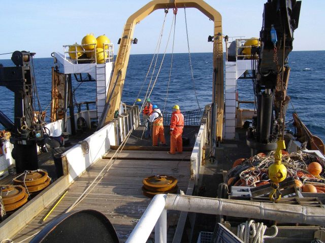 Mooring buoy operations off the NOAA Ship MILLER FREEMAN. Picture