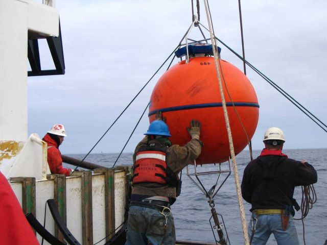 Deploying oceanographic buoy from stern of NOAA Ship MILLER FREEMAN Picture