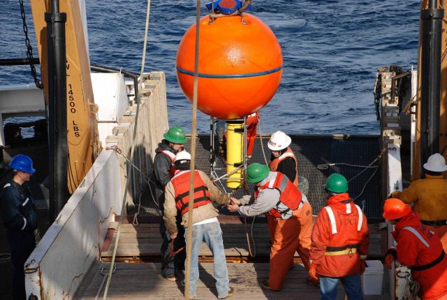 Making last minute adjustments to oceanographic buoy Picture