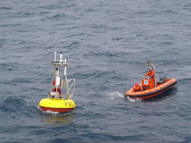 FOCI (Fisheries Oceanography Coordinated Investigations) buoy mooring operations off the NOAA Ship MILLER FREEMAN. Picture