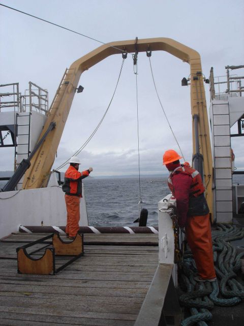 Deploying an oceanographic instrument off the stern. Picture