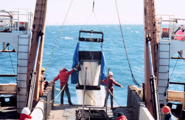 Deploying a large plankton net from the stern of the MILLER FREEMAN. Picture