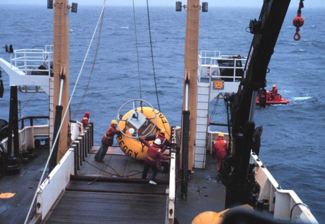 Servicing PEGGY, a meteorological and oceanographic buoy in the Aleutian Islands area. Picture