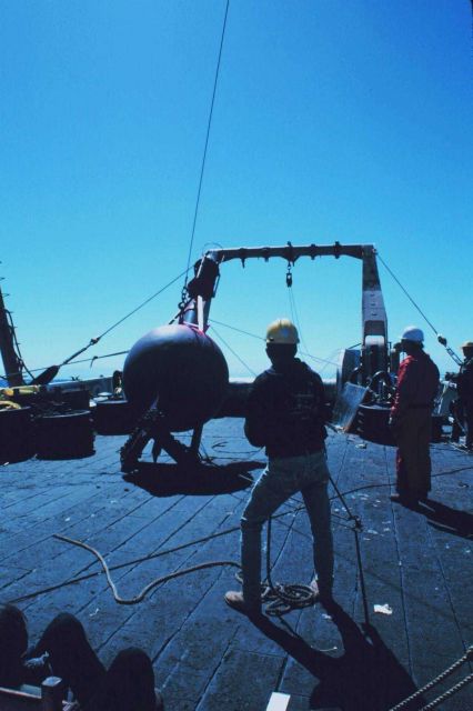 Preparing to launch a buoy during Gulf Stream eddy studies from the stern of the NOAA Ship ALBATROSS IV. Picture