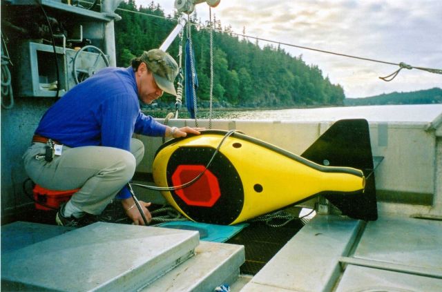 David Csepp and 38 kHz hydroacoustic tow fin used to conduct acoustic surveys Picture