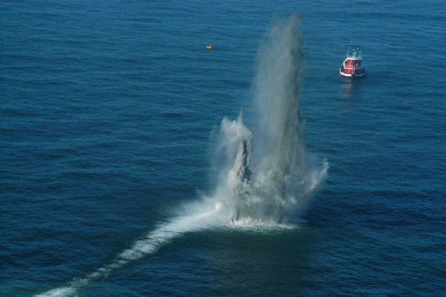 The Big Bang! An old non-producing oil platform is being removed by detonating explosives below the sea floor to sever the legs Picture