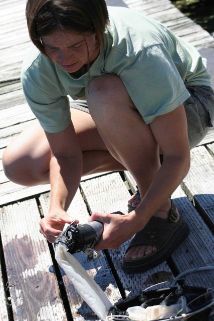 Hollings Marine Scholar demonstrates water sampling for interns during tour of Manchester Marine Station. Picture