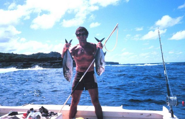 Diver with two jacks (Ulua) Picture