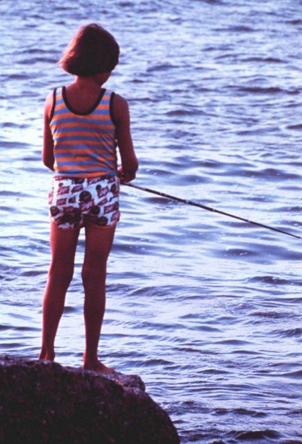 Young lady tries her luck fishing from the jetty at Port Aransas Picture