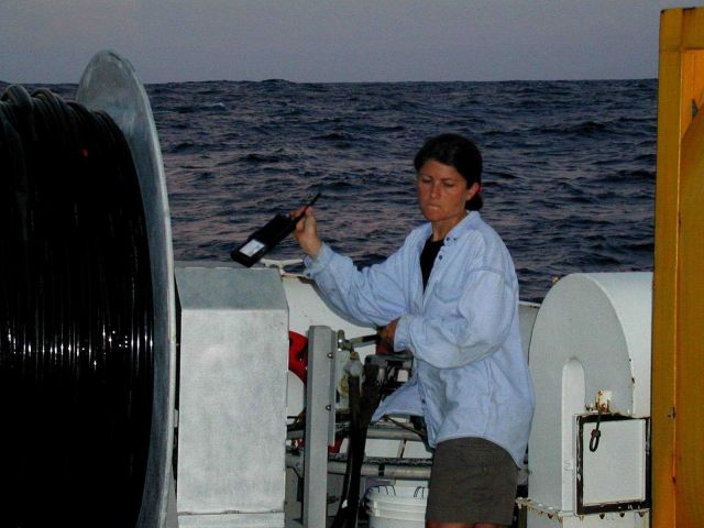 Monitoring deployment of acoustic listening array from stern of McARTHUR Picture